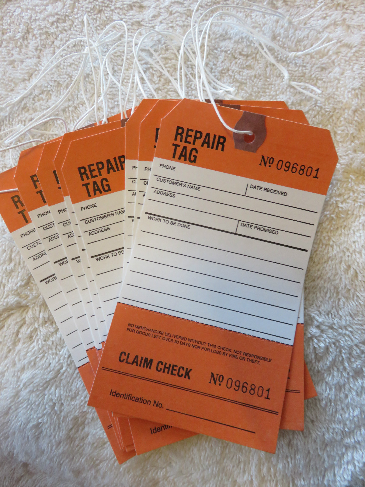 🎯🎯LOT OF 25-“CUSTOMER REPAIR TAGS” PERFORATED W/LOOP STRING.🎯🎯