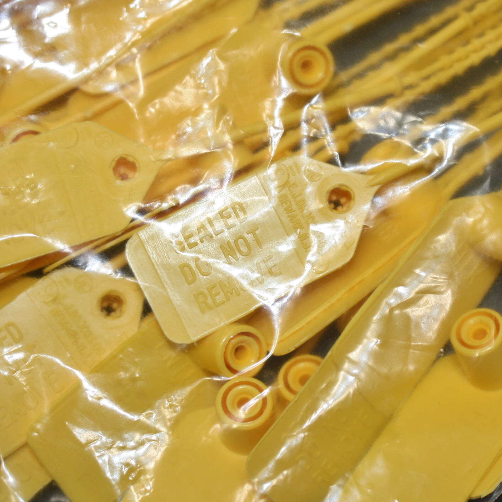 (100) Amerex Fire Extinguisher Tamper Seals 01387-P100, Yellow Cable Lock Tag