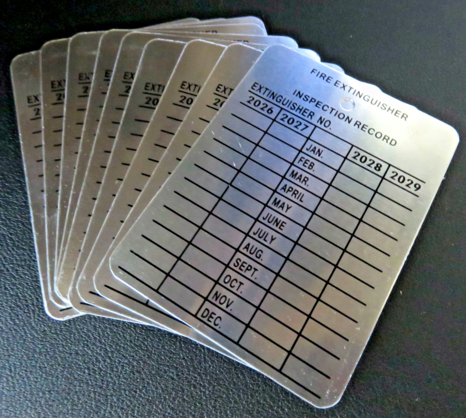 (TEN) METAL FIRE EXTINGUISHER 4-YEAR INSPECTION TAGS…2024-2025-2026-2027