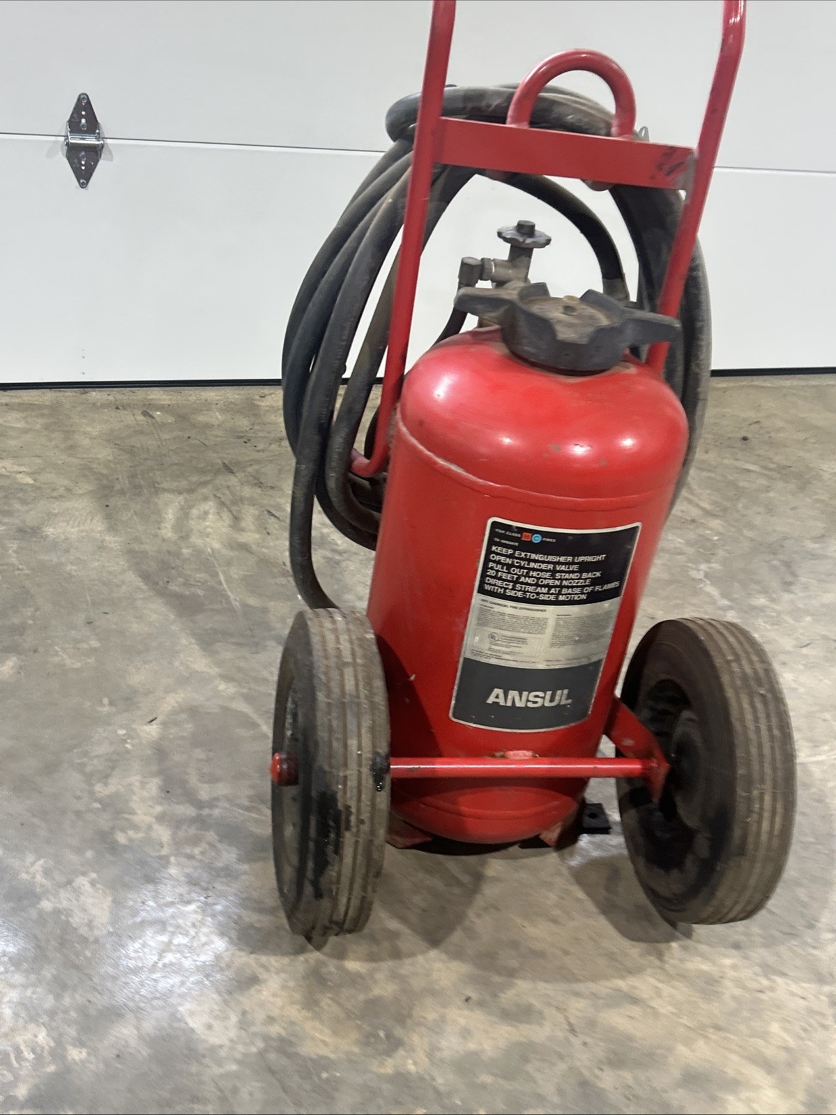 Ansul dry chemical fire extinguisher Model L-k-150D Class B,c Fires Wheeled Fire